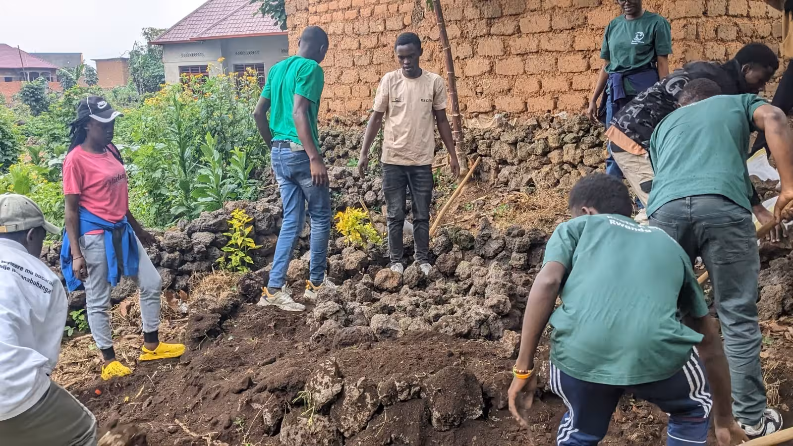 Volunteers planting in kitchen garden